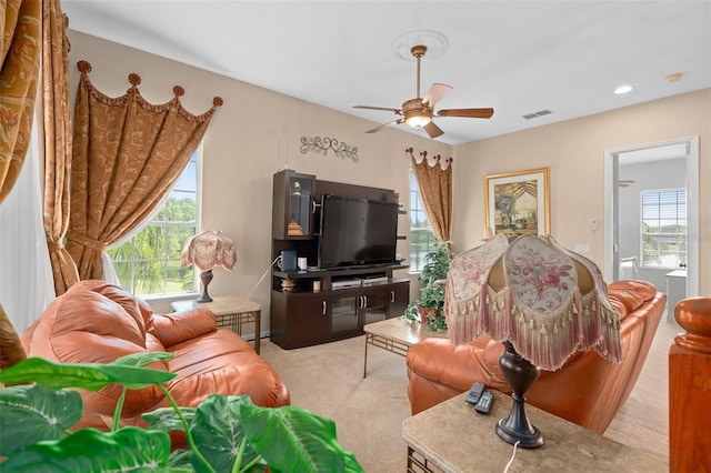 15037 Cedar Branch Way, Orlando, FL 32824 - living room with carpet flooring, plenty of natural light, and ceiling fan