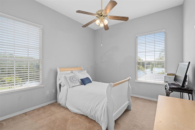 15037 Cedar Branch Way, Orlando, FL 32824 - bedroom featuring carpet, baseboards, and a ceiling fan