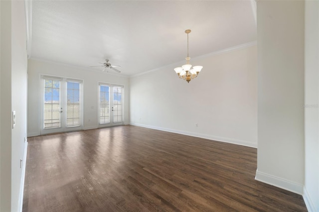7468 Excitement Dr Unit 101, Reunion, FL 34747 - unfurnished room featuring dark wood-type flooring, ornamental molding, ceiling fan, and baseboards