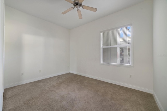 7468 Excitement Dr Unit 101, Reunion, FL 34747 - unfurnished room with carpet, baseboards, and ceiling fan