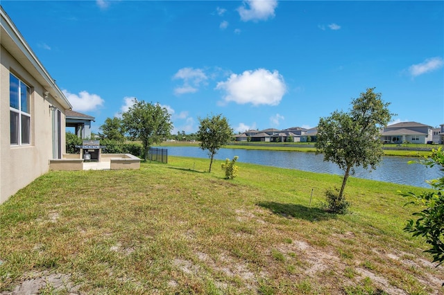 5133 Chickadee St, Saint Cloud, FL 34771 - view of grassy yard with a water view and a residential view