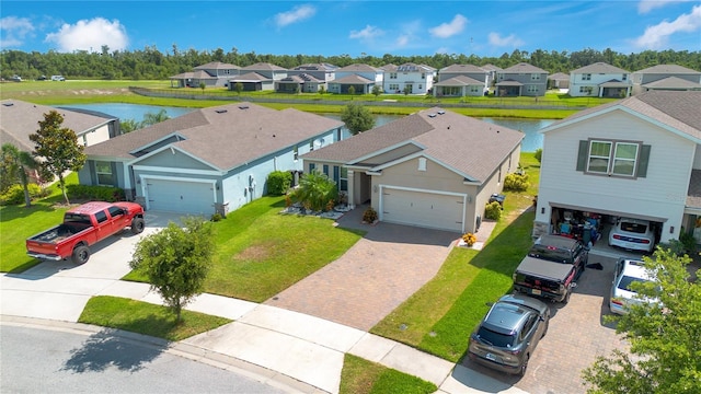 5133 Chickadee St, Saint Cloud, FL 34771 - aerial perspective of suburban area featuring a large body of water