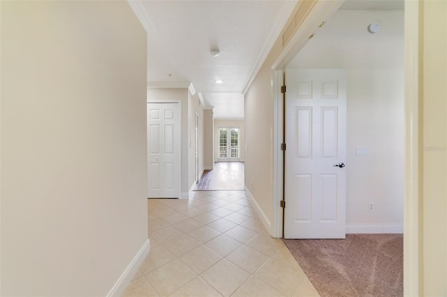 1501 Northern Harrier Way Unit 202, Reunion, FL 34747 - hall featuring ornamental molding, light tile patterned floors, baseboards, and recessed lighting