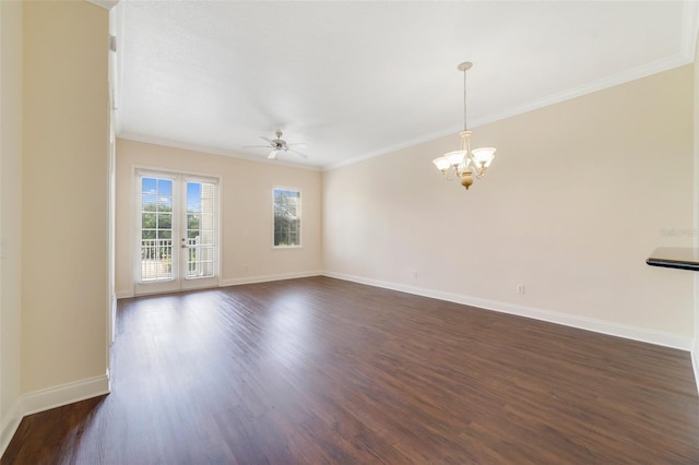 1501 Northern Harrier Way Unit 202, Reunion, FL 34747 - unfurnished living room featuring dark wood-type flooring, ornamental molding, a chandelier, a ceiling fan, and baseboards