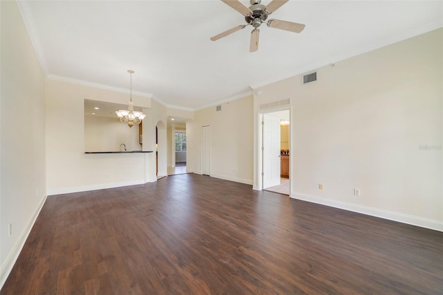 1501 Northern Harrier Way Unit 202, Reunion, FL 34747 - unfurnished living room featuring a chandelier, a ceiling fan, dark wood-type flooring, arched walkways, and baseboards