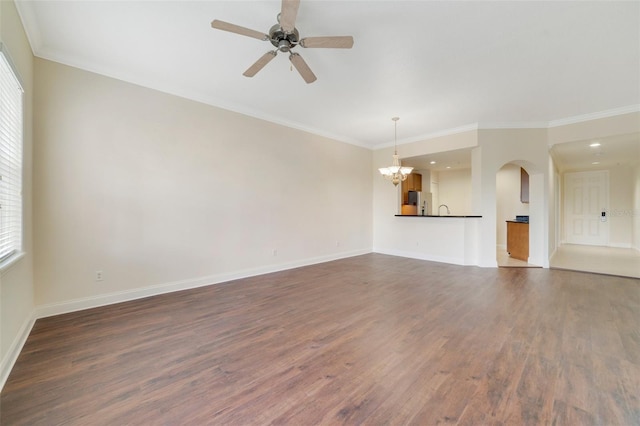 1501 Northern Harrier Way Unit 202, Reunion, FL 34747 - unfurnished living room featuring dark wood-style flooring, baseboards, a chandelier, ornamental molding, and ceiling fan
