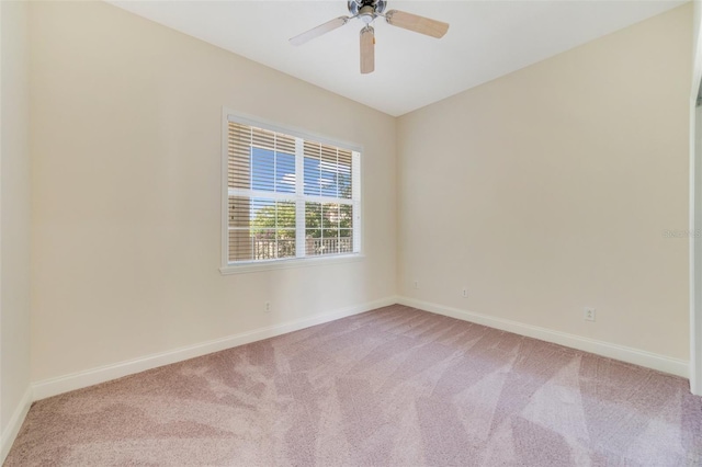 1501 Northern Harrier Way Unit 202, Reunion, FL 34747 - empty room with light carpet, baseboards, and ceiling fan