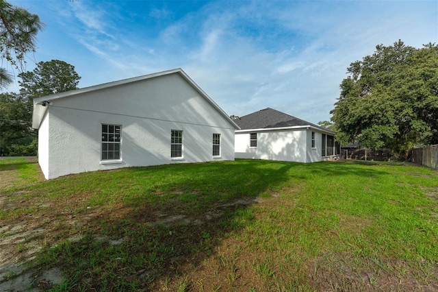 6479 Apple St, Saint Cloud, FL 34771 - rear view of property featuring stucco siding