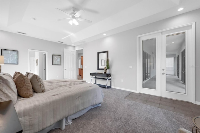 6479 Apple St, Saint Cloud, FL 34771 - carpeted bedroom with a tray ceiling, recessed lighting, french doors, access to outside, and baseboards