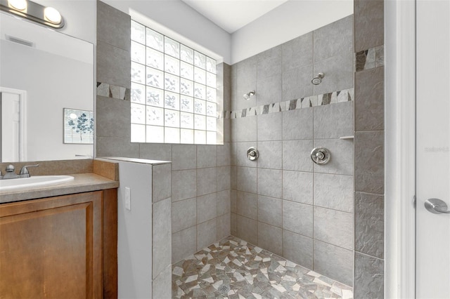 6479 Apple St, Saint Cloud, FL 34771 - bathroom featuring walk in shower and vanity