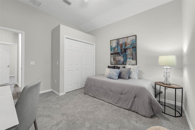 6479 Apple St, Saint Cloud, FL 34771 - carpeted bedroom featuring baseboards, a closet, and vaulted ceiling