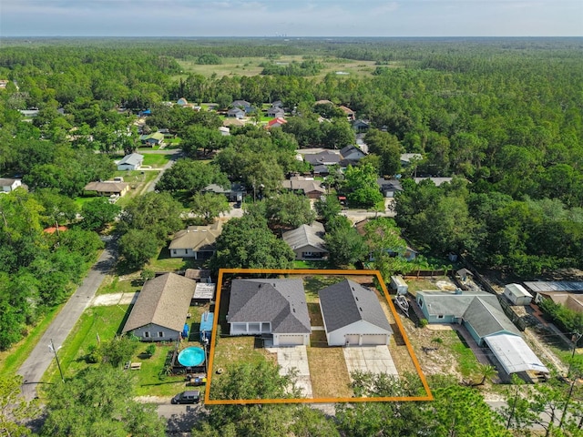 6479 Apple St, Saint Cloud, FL 34771 - aerial perspective of suburban area with a heavily wooded area and property parcel outlined