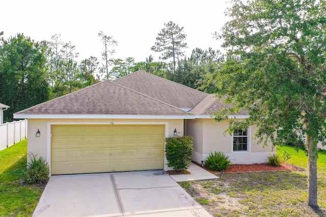56 Levee Ln, Ormond Beach, FL 32174 - ranch-style home featuring stucco siding, concrete driveway, roof with shingles, and a garage
