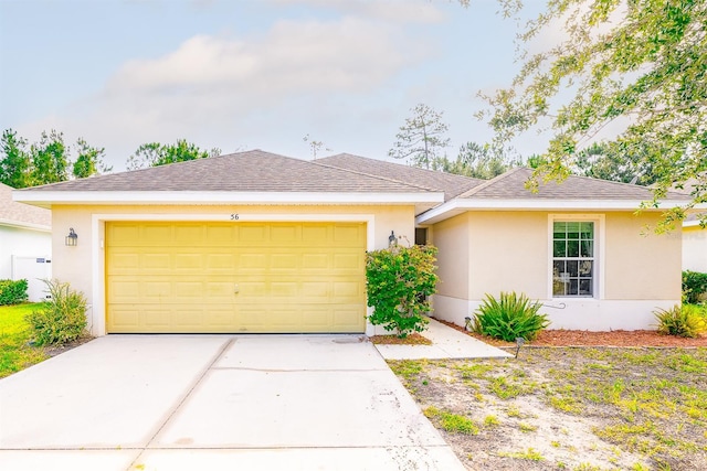 56 Levee Ln, Ormond Beach, FL 32174 - single story home with stucco siding, concrete driveway, a garage, and a shingled roof