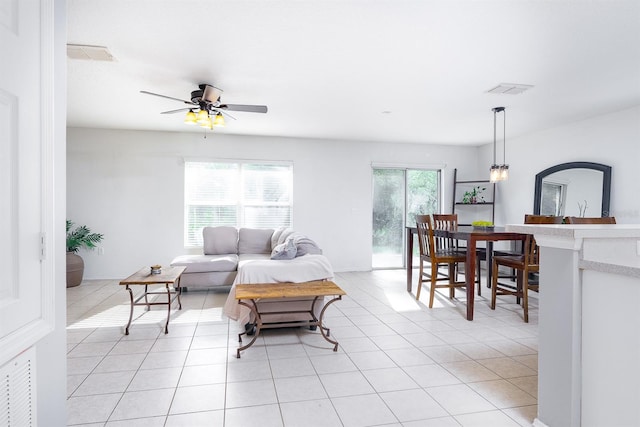 56 Levee Ln, Ormond Beach, FL 32174 - living area with light tile patterned floors and a ceiling fan