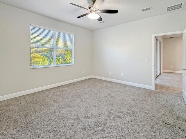 2164 Crosston Cir, Orlando, FL 32824 - carpeted empty room featuring a ceiling fan and baseboards