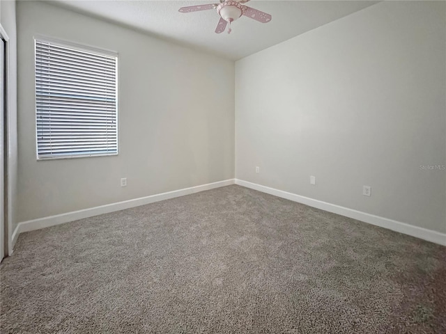 2164 Crosston Cir, Orlando, FL 32824 - carpeted empty room with a ceiling fan and baseboards