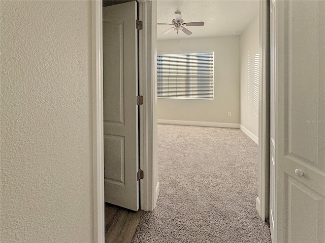 2164 Crosston Cir, Orlando, FL 32824 - hallway featuring carpet floors and baseboards