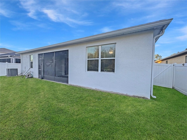2164 Crosston Cir, Orlando, FL 32824 - back of house with central air condition unit and stucco siding