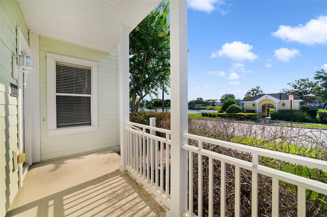 7740 Linkside Loop, Reunion, FL 34747 - covered porch with a water view