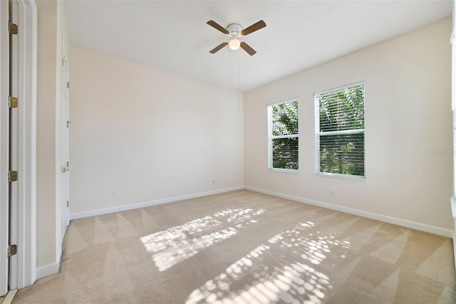 7740 Linkside Loop, Reunion, FL 34747 - carpeted spare room with ceiling fan and baseboards