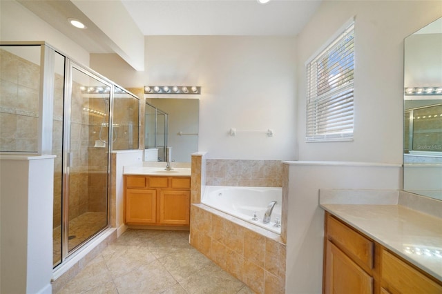 7740 Linkside Loop, Reunion, FL 34747 - full bath featuring two vanities, tile patterned flooring, a stall shower, and a garden tub