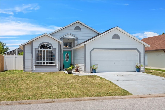 142 Ethan Ave, Davenport, FL 33897 - view of front of home featuring a garage and driveway