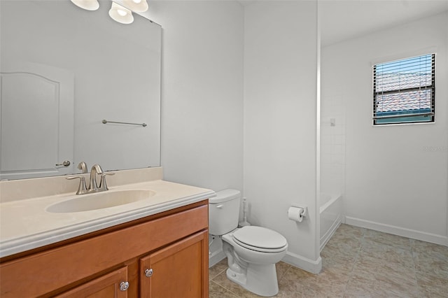 1394 Palmetto Dunes St, Champions Gate, FL 33896 - full bathroom featuring vanity, toilet, baseboards, and tile patterned floors
