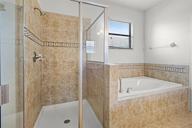 1394 Palmetto Dunes St, Champions Gate, FL 33896 - bathroom featuring a shower stall and a bath