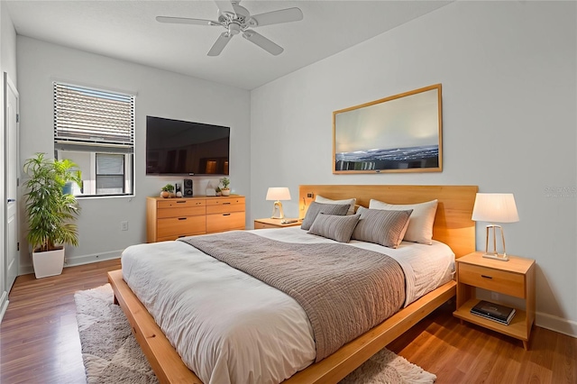 1394 Palmetto Dunes St, Champions Gate, FL 33896 - bedroom with baseboards, light wood finished floors, and ceiling fan