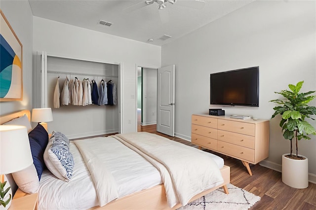 1394 Palmetto Dunes St, Champions Gate, FL 33896 - bedroom featuring a closet, wood finished floors, baseboards, and a ceiling fan