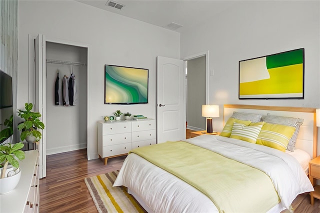 1394 Palmetto Dunes St, Champions Gate, FL 33896 - bedroom with wood finished floors, a closet, and baseboards
