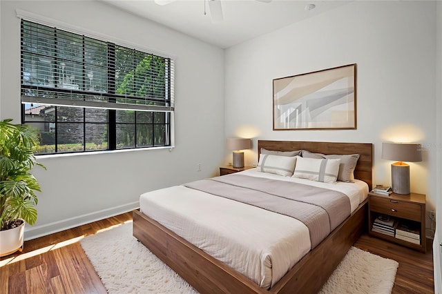 1394 Palmetto Dunes St, Champions Gate, FL 33896 - bedroom featuring wood finished floors and baseboards
