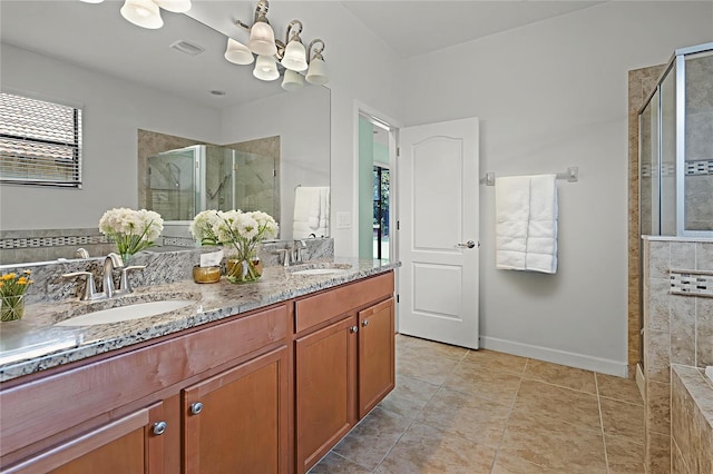 1394 Palmetto Dunes St, Champions Gate, FL 33896 - full bathroom featuring a shower stall, double vanity, healthy amount of natural light, and baseboards