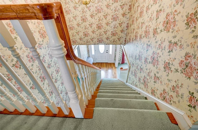 5150 Gentry Oaks Pl, Saint Cloud, FL 34772 - staircase featuring wallpapered walls and baseboards