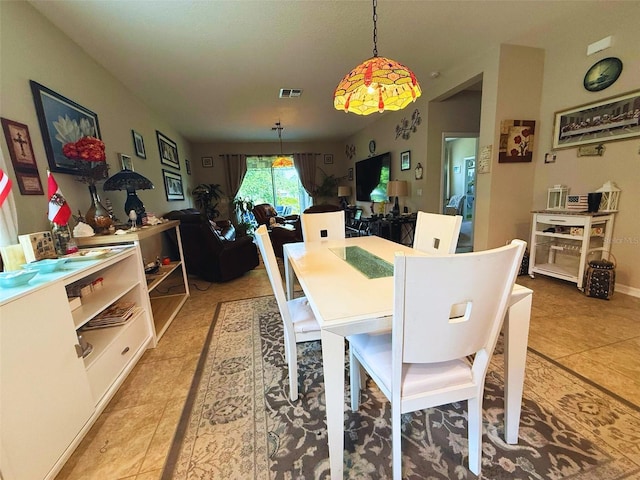 3333 Sagebrush St, Harmony, FL 34773 - dining space featuring light tile patterned floors