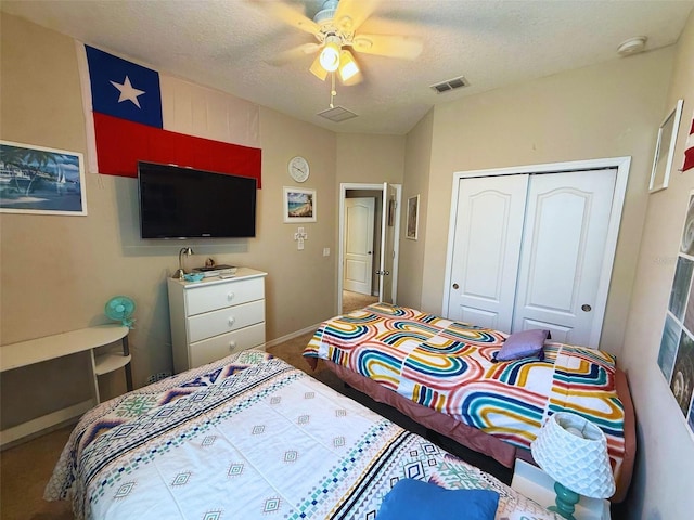 3333 Sagebrush St, Harmony, FL 34773 - bedroom featuring a closet, a textured ceiling, carpet, ceiling fan, and baseboards