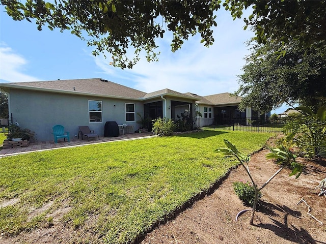3333 Sagebrush St, Harmony, FL 34773 - back of property with stucco siding and a patio area