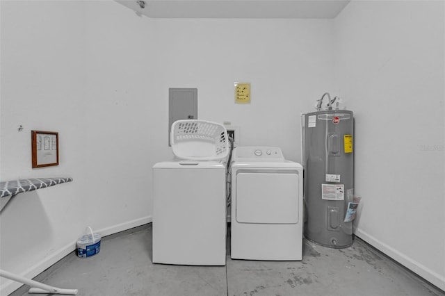 5038 Tideview Cir Unit 21, Orlando, FL 32819 - washroom featuring electric water heater, washer and dryer, and baseboards