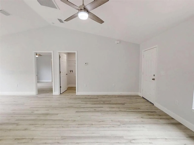 14512 SW 25th Ln, Ocala, FL 34481 - empty room with light wood-style floors, ceiling fan, baseboards, and lofted ceiling