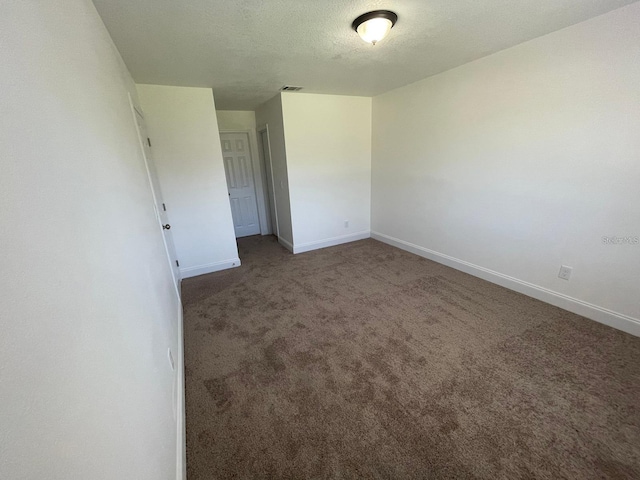 198 N Lake Ct, Kissimmee, FL 34743 - unfurnished room featuring baseboards and carpet floors