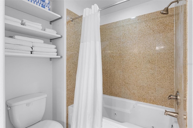 13427 Blue Heron Beach Dr Unit 1703, Orlando, FL 32821 - bathroom with a combined bath / shower with jetted tub and toilet