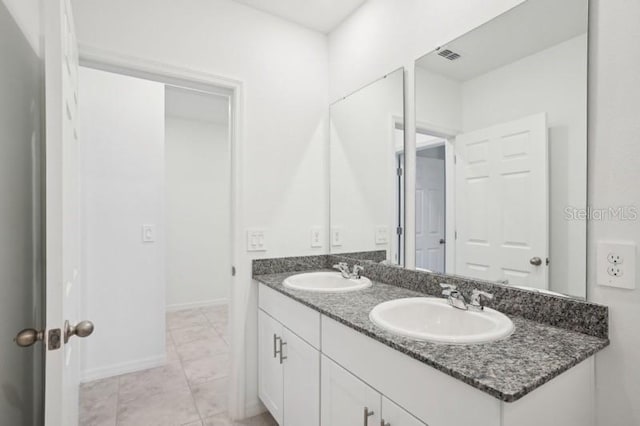 3214 Viceroy Ct, Kissimmee, FL 34759 - full bath featuring double vanity, baseboards, and tile patterned flooring