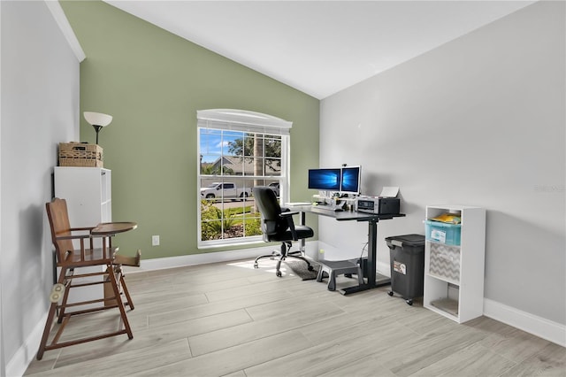 501 Dunoon St, Ocoee, FL 34761 - home office featuring vaulted ceiling, wood finished floors, and baseboards
