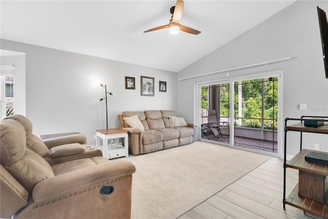 501 Dunoon St, Ocoee, FL 34761 - living room featuring a ceiling fan, wood finished floors, and high vaulted ceiling