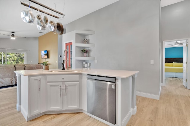 501 Dunoon St, Ocoee, FL 34761 - kitchen featuring stainless steel dishwasher, ceiling fan, a sink, and open floor plan