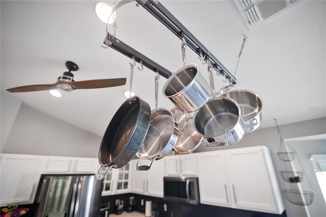 501 Dunoon St, Ocoee, FL 34761 - kitchen view of appliances with stainless steel finishes, white cabinets, and a ceiling fan