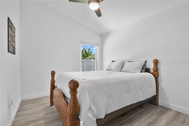 501 Dunoon St, Ocoee, FL 34761 - bedroom featuring wood finished floors, baseboards, vaulted ceiling, and ceiling fan