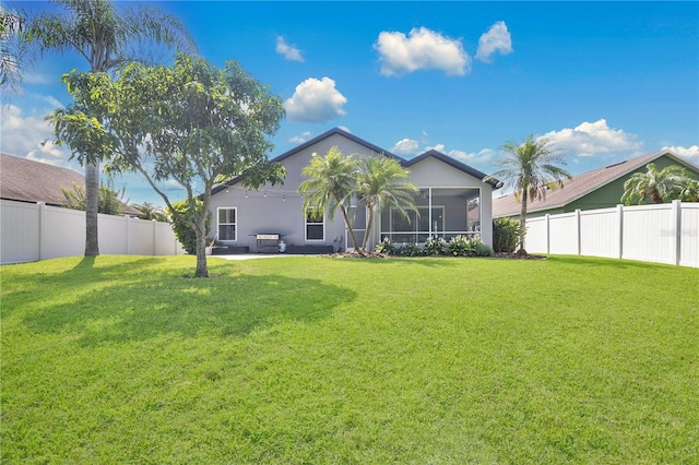 501 Dunoon St, Ocoee, FL 34761 - back of property with a sunroom and stucco siding
