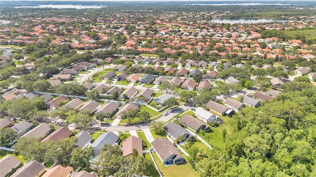 501 Dunoon St, Ocoee, FL 34761 - aerial overview of property's location with a large body of water and nearby suburban area